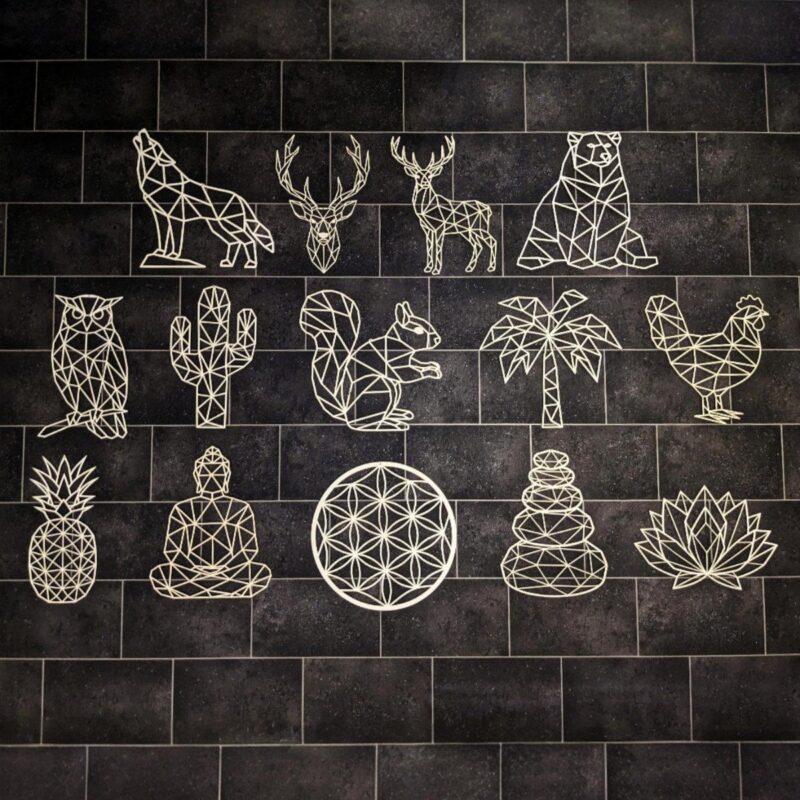 Verschiedene Low-Poly-Holzdekorationen von FineDeko – Tier- und Naturmotive aus Pappelholz, modern gelasert und präzise gefertigt.